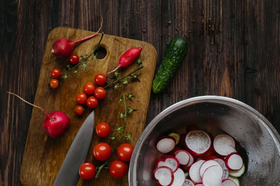 Fresh ingredients arranged on a table for a simple shared meal.